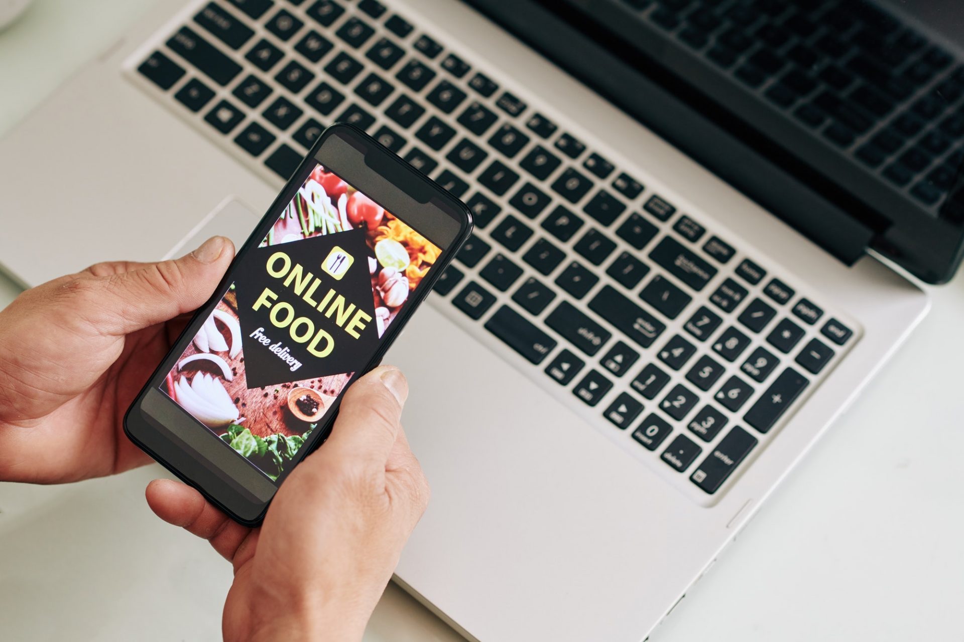 businessman-ordering-meal-delivery-e1616580839490.jpg